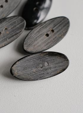 38mmx16mm一颗英国Textile Garden椭圆凹弧面纹理水牛角纽扣