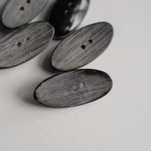 38mmx16mm一颗英国Textile Garden椭圆凹弧面纹理水牛角纽扣