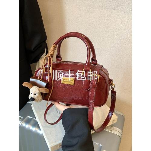 全球 韩系小众手提保龄球包包女2026新款单肩斜挎包秋冬覆古枕头