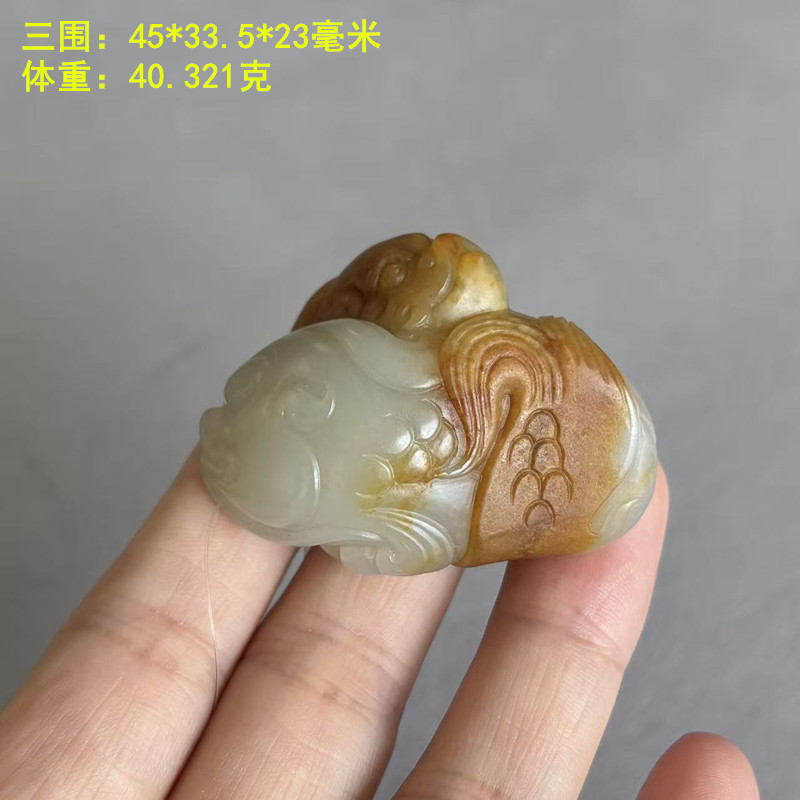 黄沁皮白玉籽料鱼化龙挂件