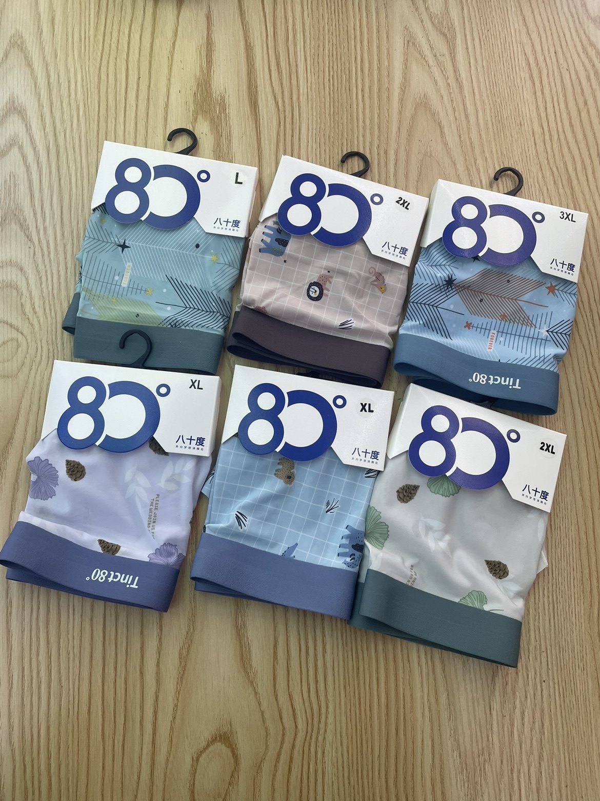 80度中腰印花男士冰丝内裤舒适柔软透气网孔抗菌平角四角裤无痕