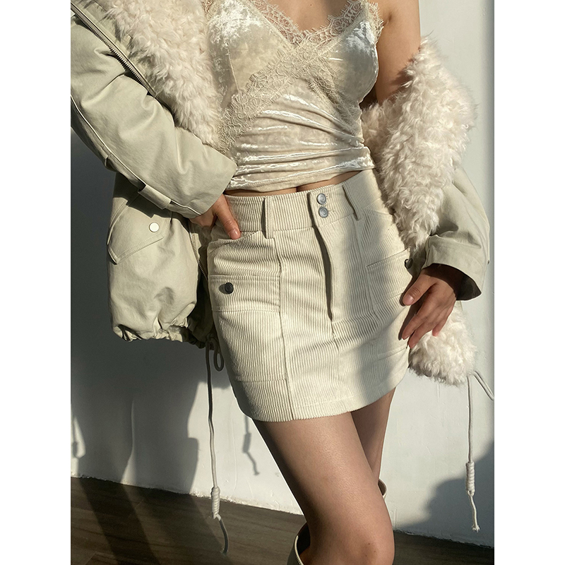 米白色银扣多口袋灯芯绒半身裙