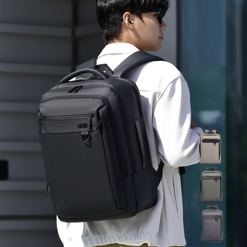 新款商务双肩包男女休闲简约通勤电脑背包防水大容量登机包旅行包