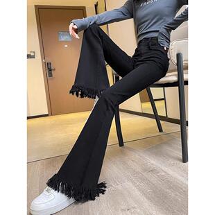 春装女童儿童显瘦裤子微喇喇叭裤黑色2026大童新款牛仔裤毛边修身