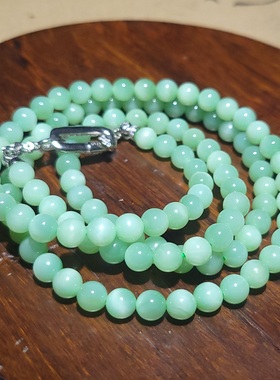 YQ123108 37.4克，6mm新疆黑羊洞醉美鲜薄荷绿猫眼起荧光碧玉挂链