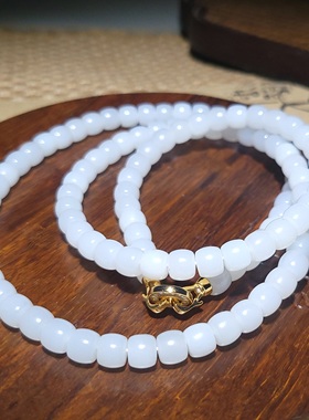 新疆的猫YQ120302 61.0克细糯新疆且末金山羊脂玉108颗老型珠挂链