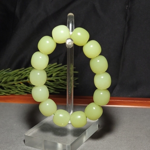 新疆的猫L091005 87.3克直径16-15mm色调油亮且末黄口玉手链