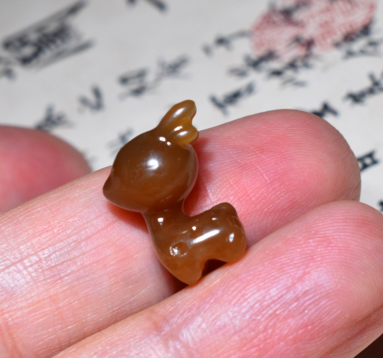 新疆的猫JJ112308  1.7克，质感油润的红糖细料卡通小鹿