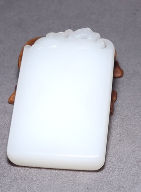 新疆的猫L112605 66.0克顶细顶润黑皮俄料三高羊脂白玉府上有龙