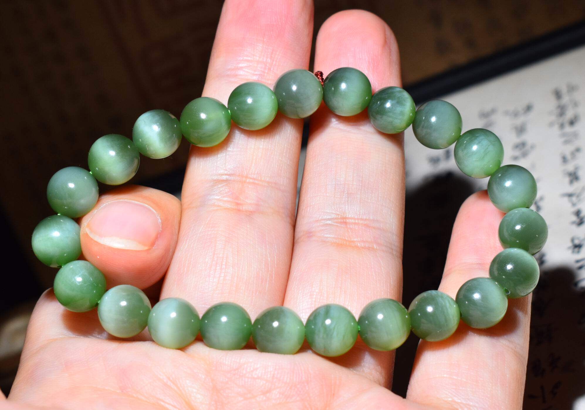 JJ030201新疆的猫17.6克直径8mm纯净的老坑俄料碧玉猫眼圆珠手链