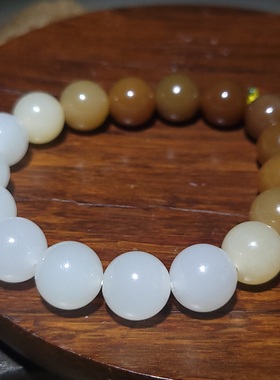 新疆的猫YQ010808 直径12mm29克色调油亮且末糖白渐变圆珠手链