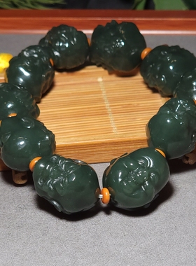 新疆的猫L122302 160.7克鲜靓柔美飘蓝色调且末青玉罗汉手持