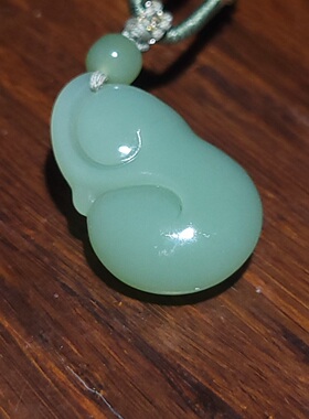 新疆的猫YQ100607 9.1克色泽舒适的起荧光玻璃底俄料粉青碧玉如意