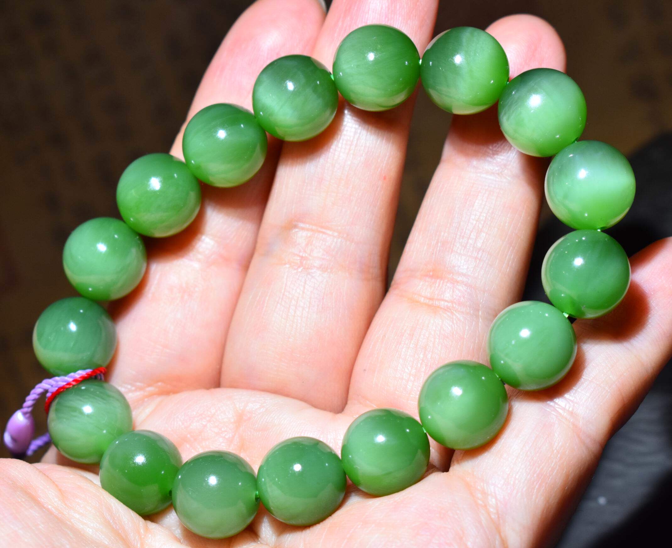 JJ030702新疆的猫46.3克12mm肉质纯净老坑俄料碧玉猫眼圆珠手链