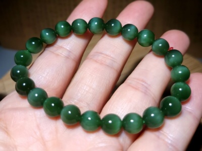 zg011406新疆的猫17.5克直径8mm冰莹泛宝石光猫眼碧玉手链和田玉