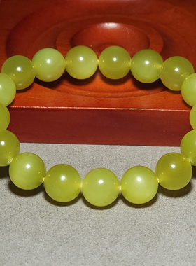 L121302 46.3克，直径12mm色调油亮颜色纯正的若羌冰黄口圆珠手链