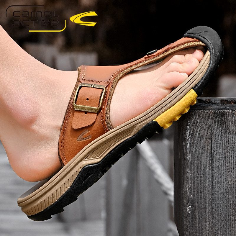 德国骆驼动感真皮包头人字拖男夏季大码外穿夹趾拖鞋户外防撞凉拖