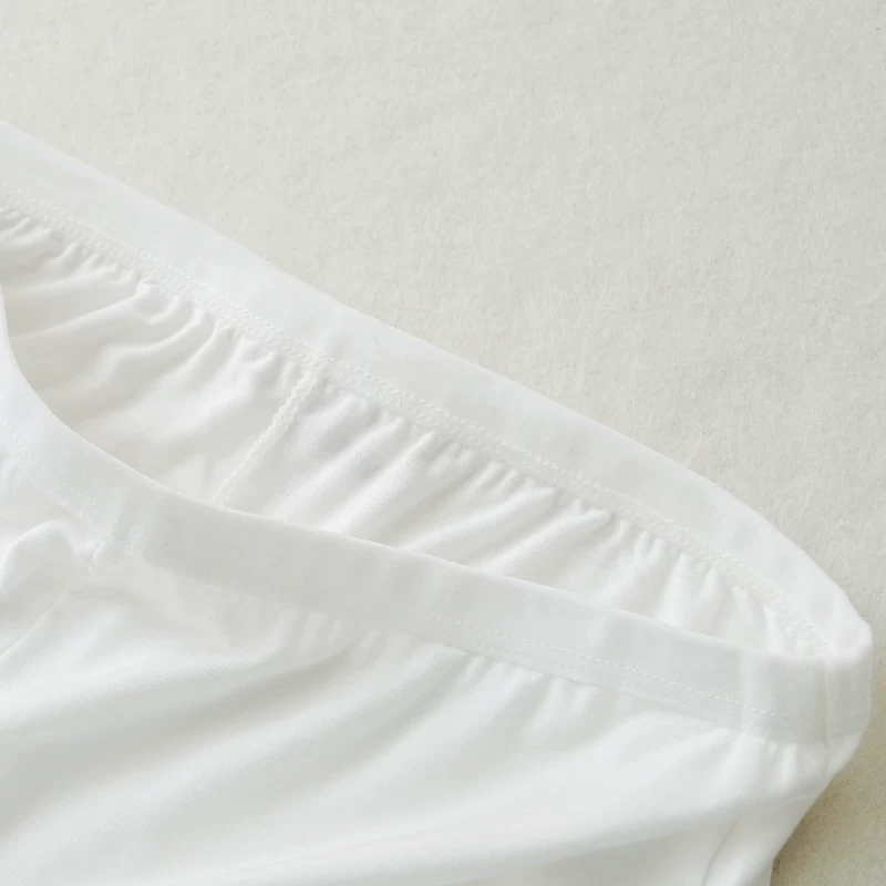 White safe trousers, protective underware, leggings, black thin shorts