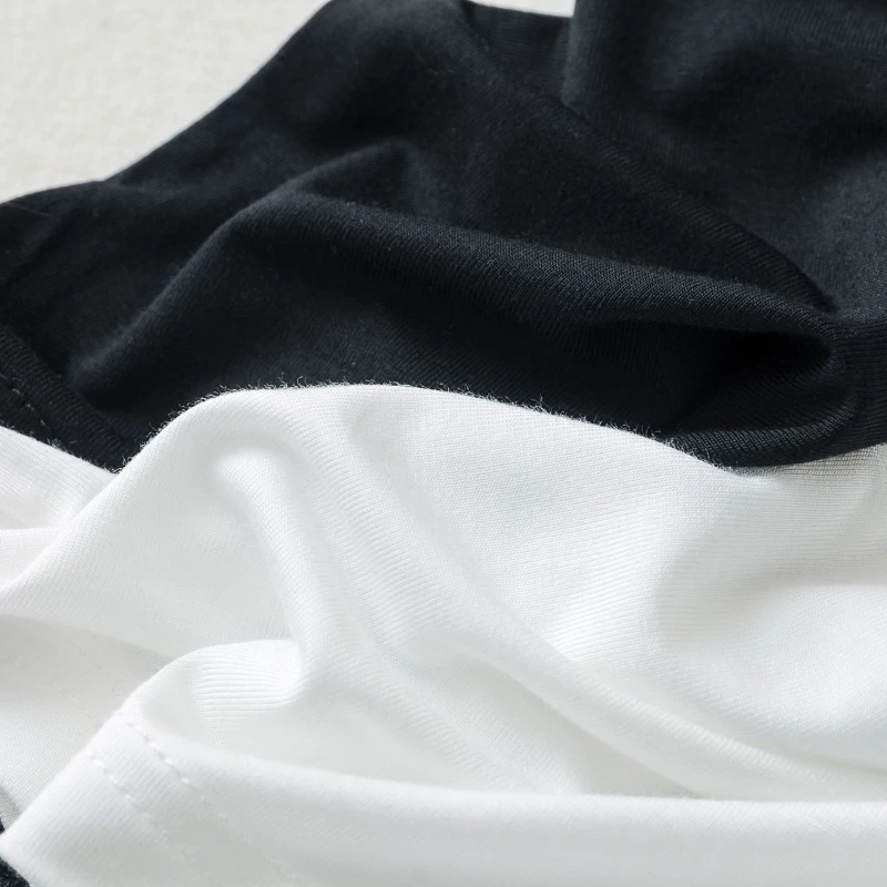 White safe trousers, protective underware, leggings, black thin shorts
