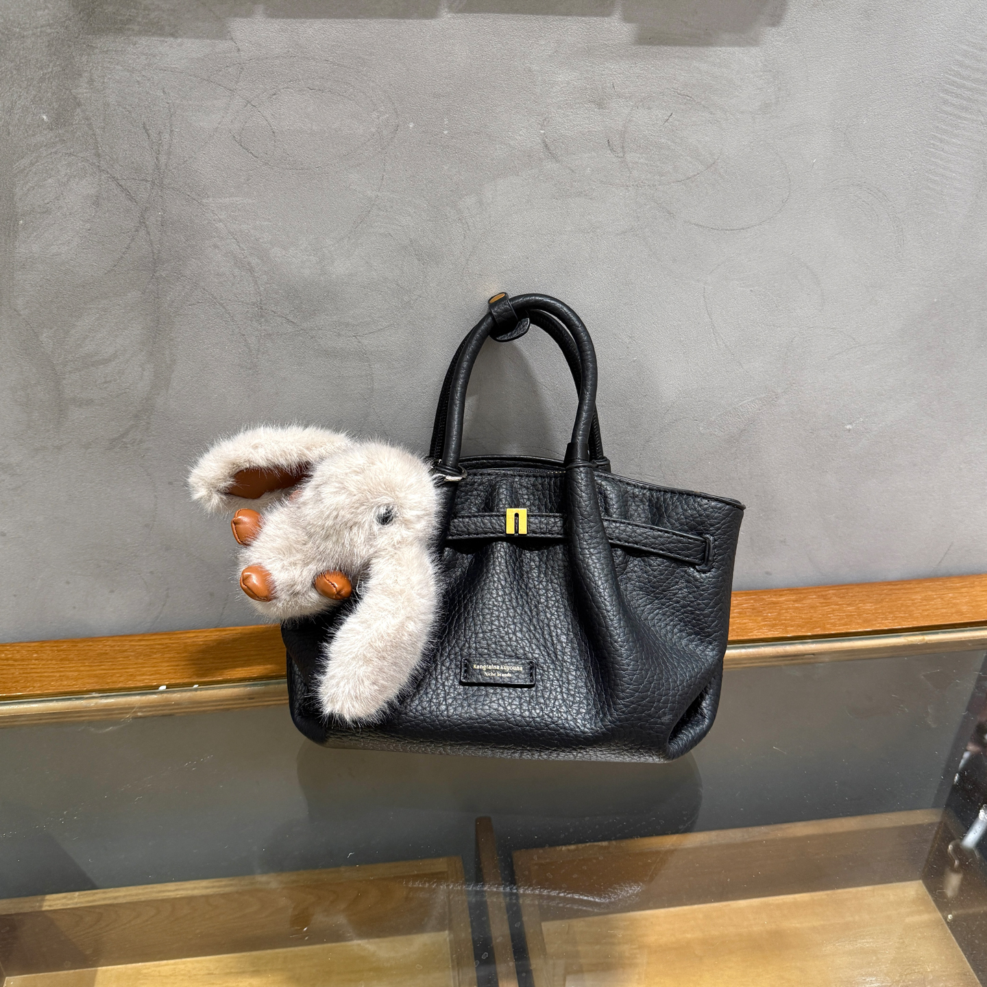 韩版气质荔枝纹牛皮褶皱手提包女2025新款通勤简约单肩腋下饺子包