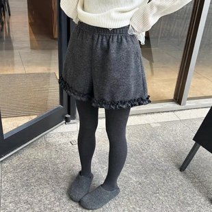欧洲站2025冬季松紧腰下摆木耳边拼接A字版显瘦百搭毛呢 休闲短裤