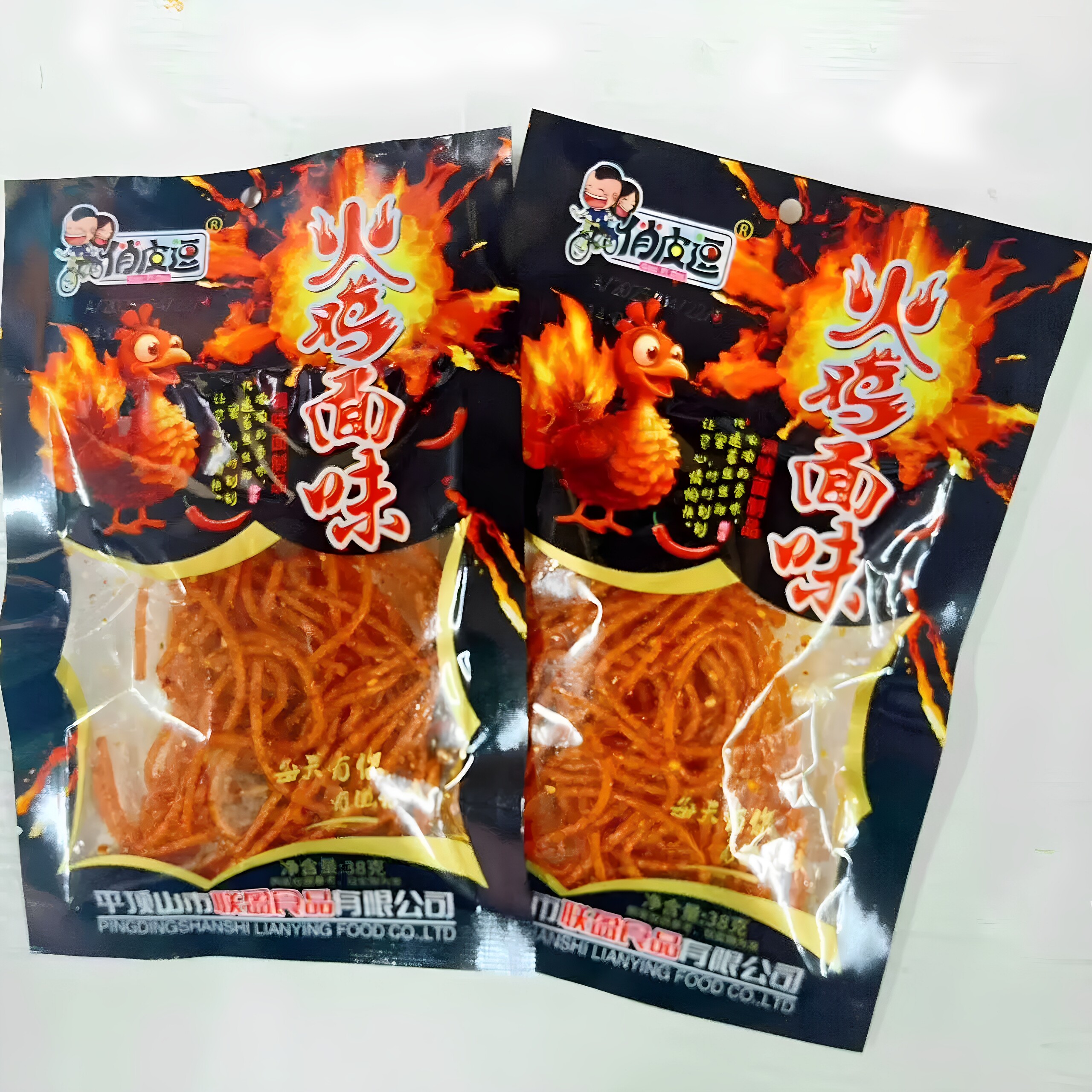 8090后怀旧零食俏皮逗火鸡面辣条香辣休闲网红辣丝辣片20袋包邮