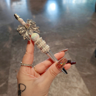 原创设计珍珠蝴蝶结中性笔