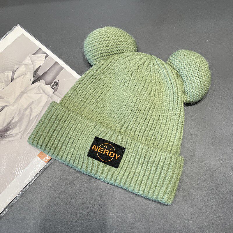 HONG KONG PURCHASING AUTUMN AND WINTER CUTE EARS THICKENED WARM WOOLEN HAT WOMENS EAR PROTECTION CASUAL AND VERSATILE KNITTED HAT TIDE