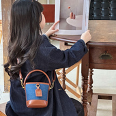 2026新款 复古格纹水桶包女童洋气单肩斜挎手拎多用出游包洋气女包