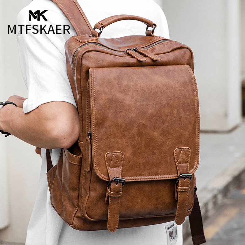 香港MTFSKAER轻奢男款真皮双肩包新款商务大容量旅行背包电脑书包