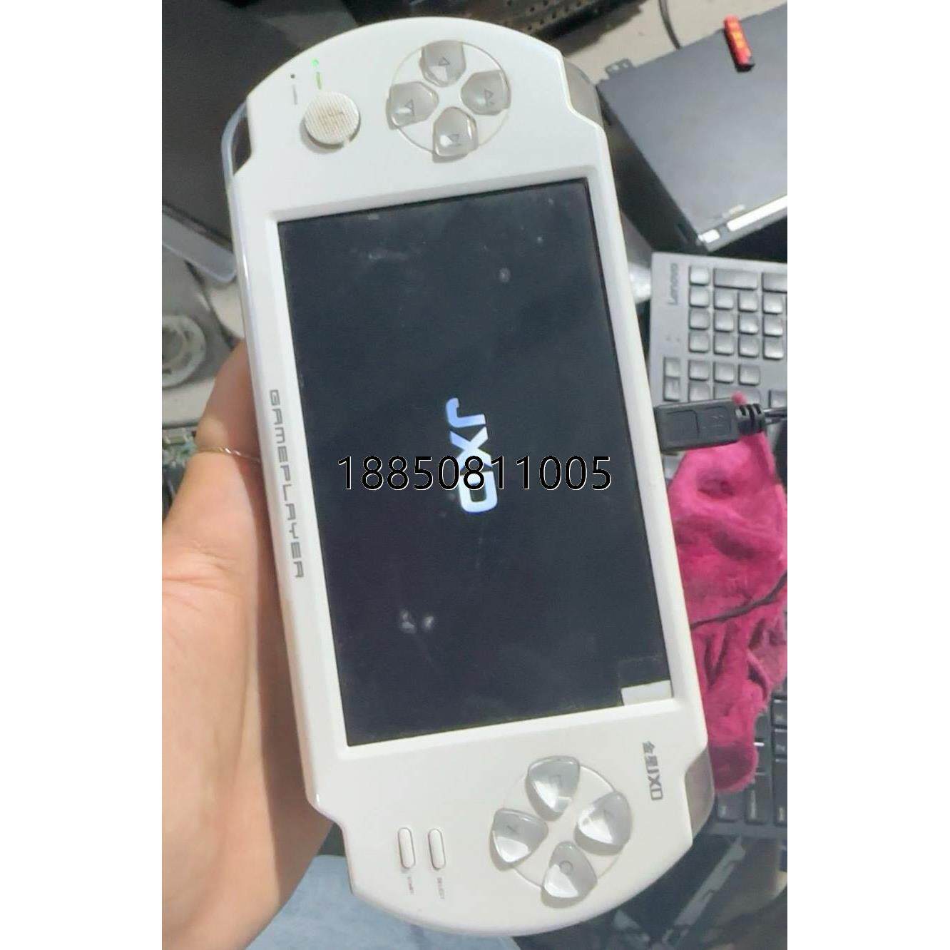议价+金星JXD5000游戏机。成色如图 没有配件 正常使用，