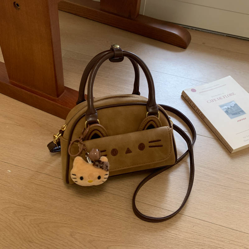 小众设计单肩斜挎包通勤保龄球包