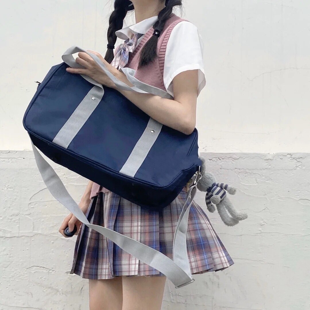 日本学生书包JK制服包日系电脑包装书包COS通勤DK手提单肩斜跨男