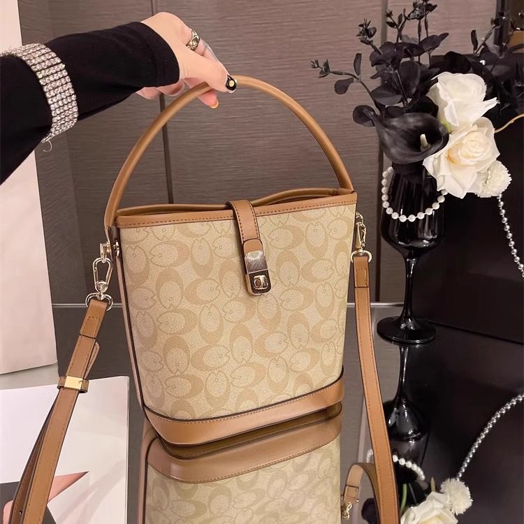 代购高级感复古小众水桶包包2026新款轻奢老花时尚百搭手提斜挎包