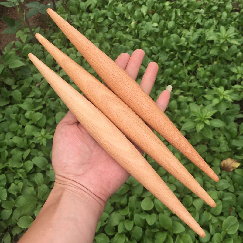 纯实木饺子皮两头尖无油漆两边粗图片