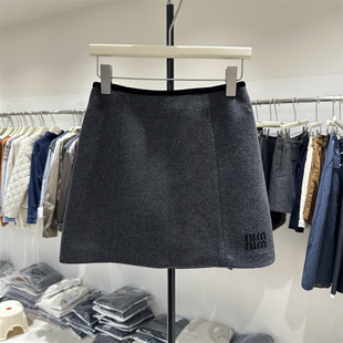 韩系2024冬季新款高腰显瘦百搭简约风字母休闲毛呢A字短裙女8090