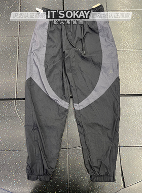 JORDAN男子春秋防风训练休闲梭织拼接宽松运动束脚长裤FN5851-010