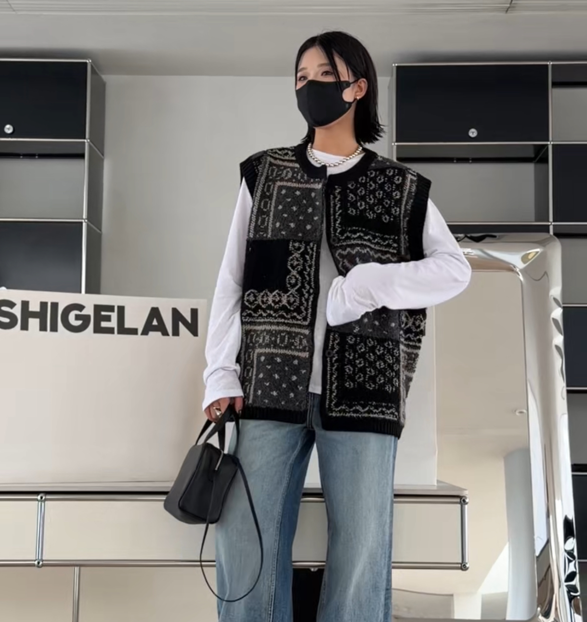 妍西家 诗歌兰女装25秋款3202时尚气质黑灰色花色针织马夹外套女