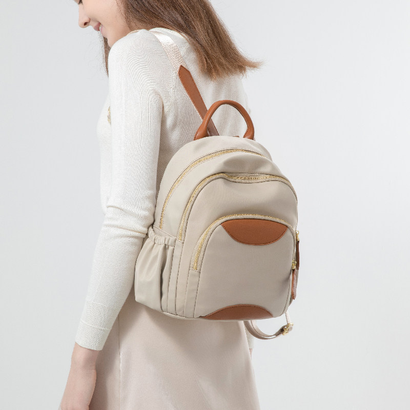 双肩包女2026新款时尚潮流轻便休闲防水百搭洋气女士牛津布小背包