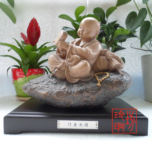 包邮台湾铁丸石 一角禅小沙弥行者无疆工艺石雕摆件石愿正品