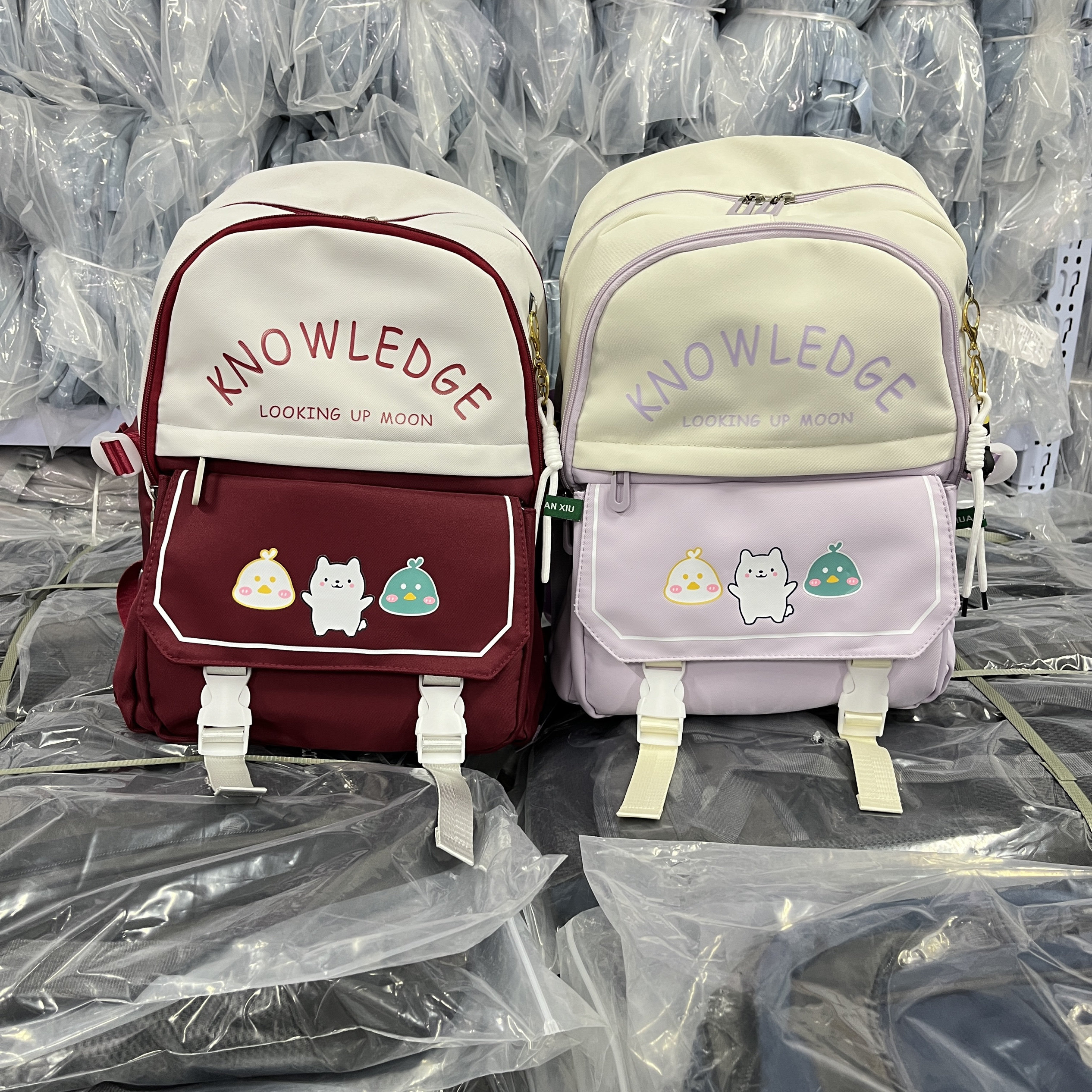 江利达9633书包女小学生三到四五六年级减负双肩包超轻大容量男生