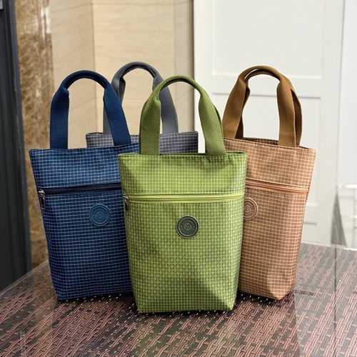 新款韩版加大手提格纹水杯袋焖烧杯雨伞包零钱钥匙手机手拎袋女包