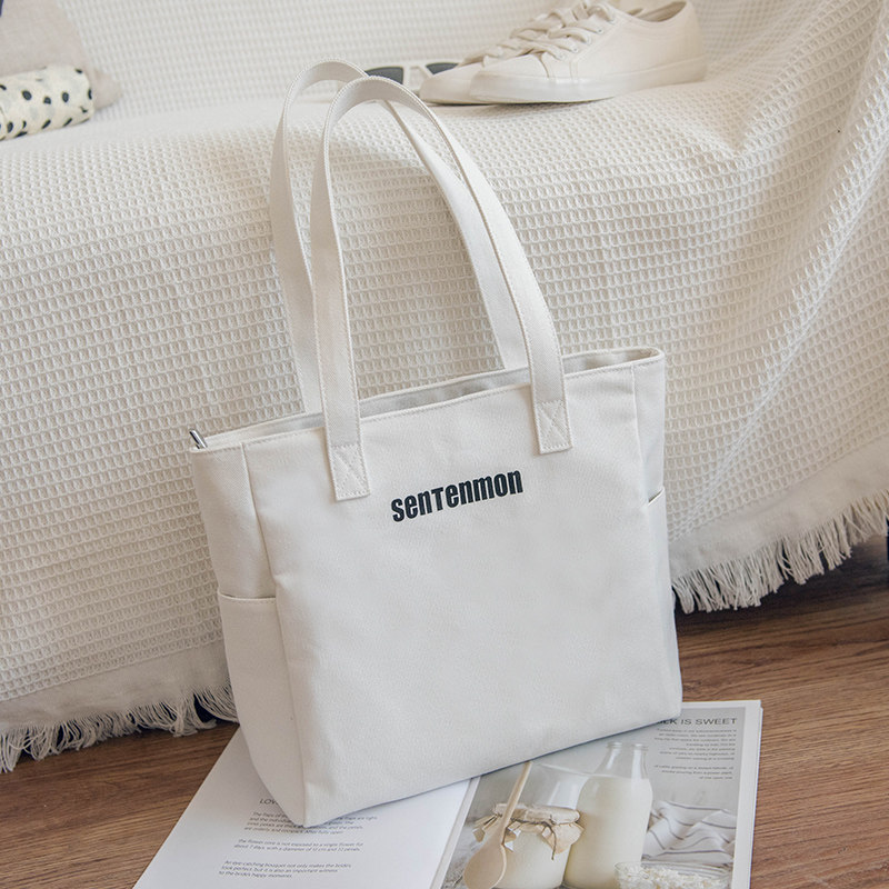 日系简约帆布包包2021新款女包大容量休闲字母学生单肩包手提大包