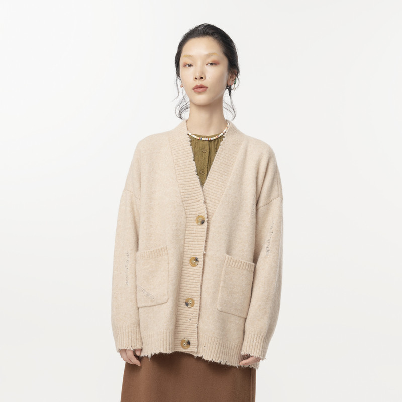 V领 大口袋 不规则镂空