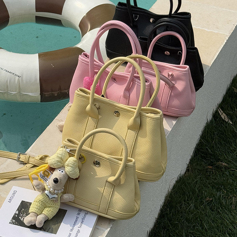 韩版简约水桶包女2025新款今年流行单肩斜挎包休闲气质通勤风女包,箱包皮具/热销女包/男包,通用款女包,淘宝优惠券,粉丝福利购,淘宝优惠卷