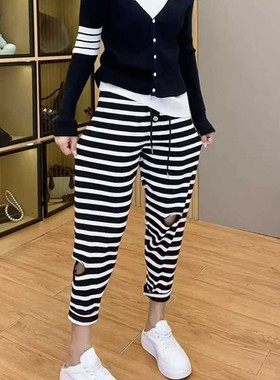 超大码2-300斤胖m夏季破洞纽扣个性休闲裤女宽松条纹九分裤哈伦裤