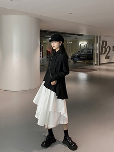2026春秋款半身裙女裙子显瘦防走光设计感不规则黑色高腰A字裤裙