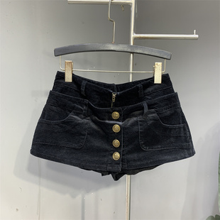 黑色低腰辣妹超短裙女2026年冬季新款个性拼接设计感纯欲半身裙飒