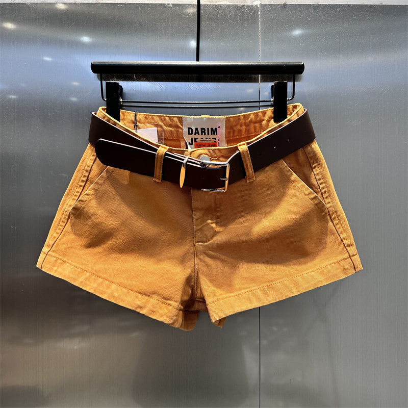 美式多巴胺亮橘色个性牛仔短裤女2026年春季新款高腰显腿长超短裤