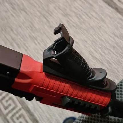 Tactical handle, angled, inclined support on the forearm PTK